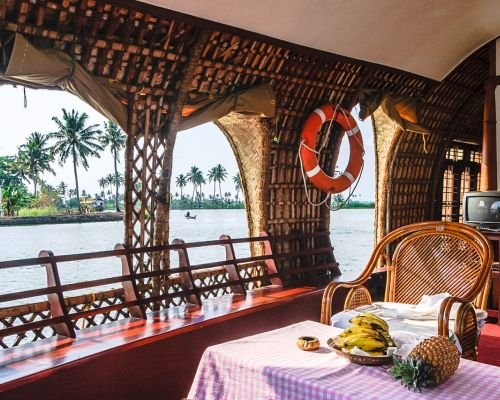 Cozy Houseboat Cabin with Ethnic Designs and Comfortable Seating