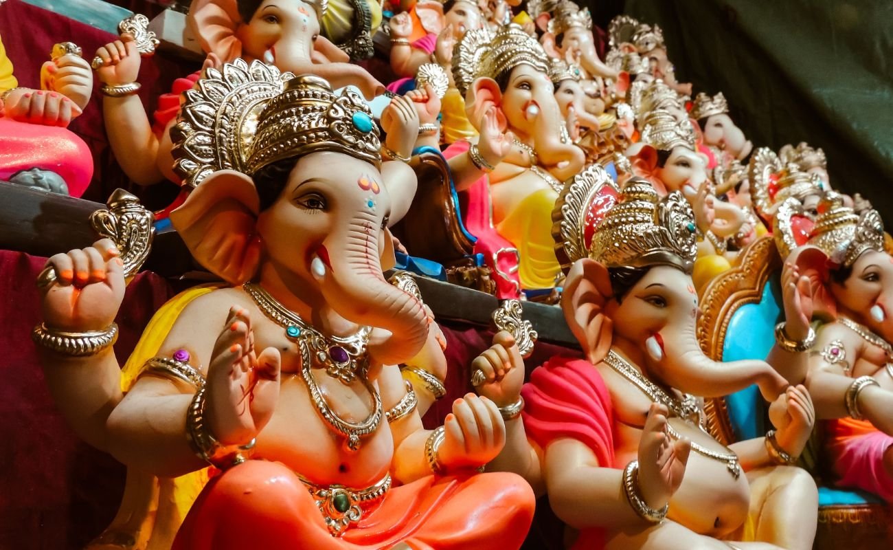 Decorated Lord Ganesh idols in a shop