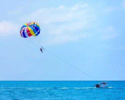 Person parasailing in the ocean